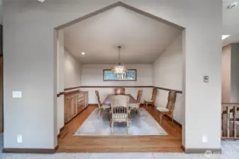 Formal dining room area with oak hardwoods