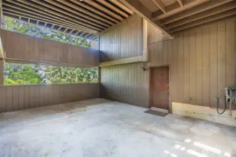 Covered patio could become a basketball court, mini-pickleball or a dance floor??