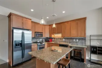 Generous kitchen with stainless appliances