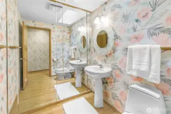 Charming Main Floor Powder Room: A thoughtfully placed half bath offering convenience and style, perfect for guests and everyday use.