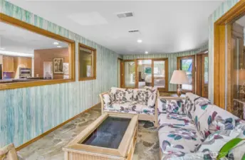 Climate-Controlled Pool Room: Dehumidifier and remote console for comfort and ease.