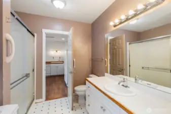 Shower with rain glass doors and easy to maintain spaces.