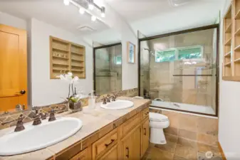 Guest full bath with accessible doors