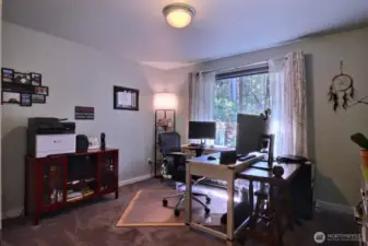 Third Bedroom. (Currently used as an office).  There are 3 bedrooms PLUS a den in the home.
