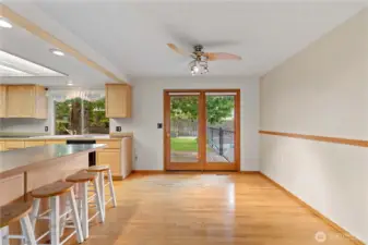 Spacious dining room with room for bar stool