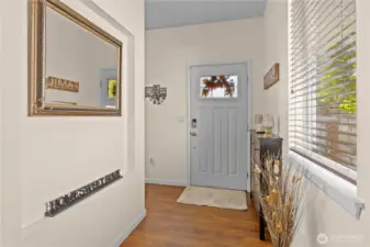 Warm entry with room for a bench or small storage