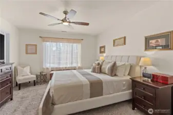Light and beautiful primary bedroom with walkin closet and attached private bathroom!