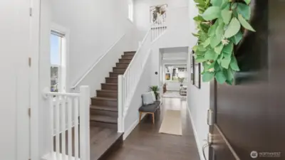 Step into this beautifully lit foyer bringing the perfect blend of modern charm & comfort.