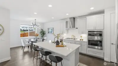 Chef-inspired kitchen with double ovens, gas cooking, and plenty of prep space for everyday meals.