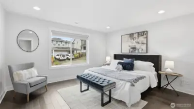 A peaceful primary bedroom designed for rest, relaxation, and everyday comfort.