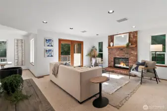 The formal living room is light and bright and connects with the dining room