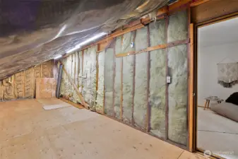 Unfinished walk-in attic space accessed from the 3rd bedroom is an amazing easy to interior storage area everyone will appreciate.  Unfinished attic space is not included on the listing as "unfinished space" as it is not referenced by Realist.  Buyer to verify sf.