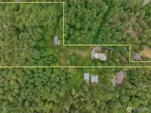 This representation of the parcel provides a sense of how large the property is and how this huge house and 3 outbuildings are dwarfed by the size of the land included in the sale. (The yellow lines are for demonstration purposes only and may not include the full or accurate boundary lines.)