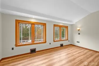 Primary bedroom windows provide an awesome view of the creek and greenbelt.