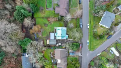 The house with the green roof could be yours. The green patina results from the copper content of the roofing.