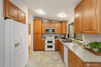 Double oven, fridge, dishwasher, and microwave all convey.