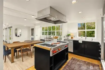 A chef's kitchen all open to the dining and living room for ease in entertainment.