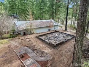 Foundation remains from previous fire.  Fully inspected septic on this lot too