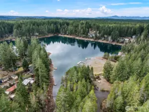 One driveway away from beach and park access.  Start blowing up the floaties!