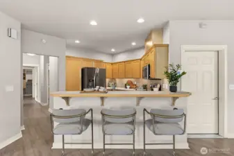 Belly up to the bar for a quick breakfast or conversation with the chef!