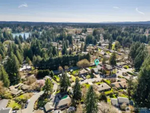 From this southwest aerial, the neighborhood really shows off what makes it special, with larger lots, mature surroundings, and a layout that feels intentional.  This home benefits from that extra breathing room both visually and functionally. In the distance, you can spot Ward Lake, and with public access just a few minutes away off Boulevard Road, it’s easy to picture summer swims, paddle days, or casting a line after work. It’s one of those quiet lifestyle perks that ends up getting used more than expected. Between the proximity to the lake, the established feel of Braemar, and the location right in Olympia’s golden triangle with walkability to Pioneer Elementary, Washington Middle, and Olympia High, this is a setting that continues to check all the right boxes.