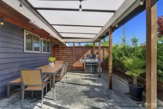 Covered patio adjacent to the kitchen - a perfect multi-season space