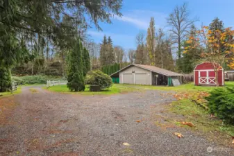 Large detached garage w/carport and shed