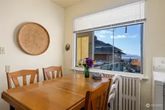 The informal dining area is in the kitchen and looks out to Bellingham Bay.