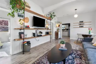 Enter into the living space with extra high ceilings and plenty of natural light!