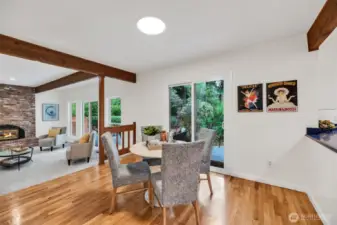 Enjoy informal dining in the kitchen's charming eating space which overlooks the park like back yard