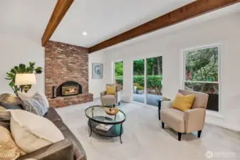 Brick fireplace with gas insert to provide added warmth on those chilly NW evenings