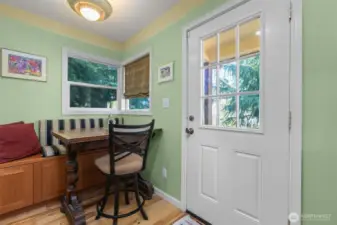 Dining nook and back entrance.