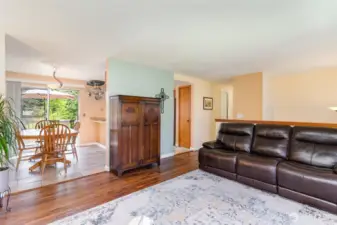 Upstairs living space has great flow into the dining area & kitchen.