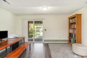 This space gets tons of natural light! Sliding door leads to the outdoor patio.