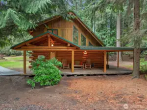 Charming UPDATED LOG home offers the perfect blend of Rustic Character & Modern Updates.
