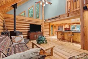 Soaring Ceilings, Beautiful Flooring, Cozy Wood Stove..This is a Picture-Perfect Log Home!!