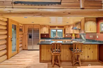 Generous Breakfast bar, Newer Flooring & Gorgeous Etched Entry Door.