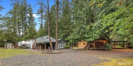 1.6 Acres with room for RV..with Power. Room for all your outdoor needs..Garden, Games, Parking.