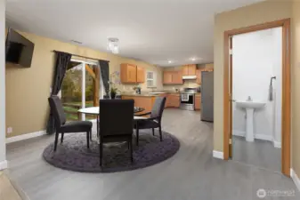 Staged Kitchen nook with sliding glass door to covered rear patio