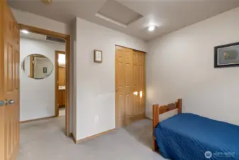 Bedroom number one with single door closet.