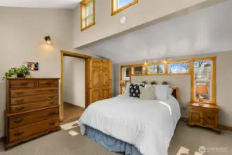 Primary Bedroom -  Spacious primary suite with abundant natural light and private access to the patio—your own peaceful retreat in the foothills above Lake Chelan.