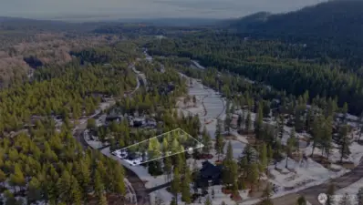 A flat, 1/2 acre property with a large building envelope. All utilities are available in the street.