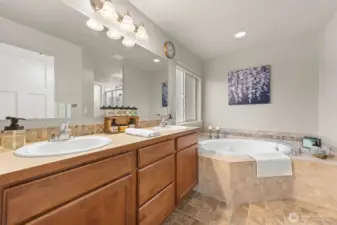 5-piece ensuite Primary Bath with soaking tub and walk-in closet
