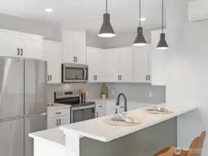 Kitchen features a large island for dining.