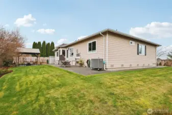 View of the backyard and rear exterior of the home.