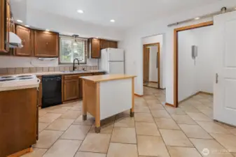 Tiled flooring in the spacious kitchen.