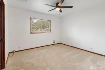 Main bedroom with door to the the bathroom.