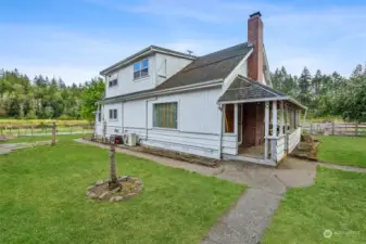 The other side of the house features a covered porch.