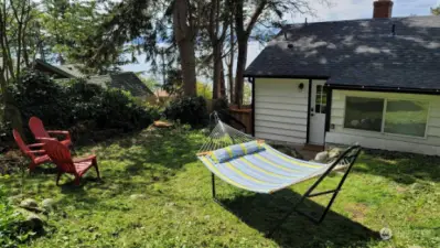 Return from the beach and relax in the backyard on a beautiful sunny day.