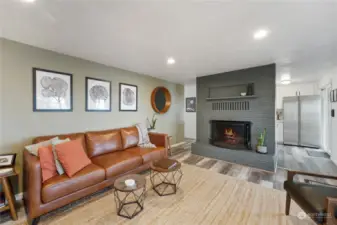 Enjoy the spacious Great Room with views and a wood burning fireplace.